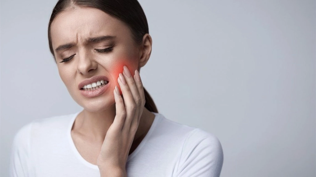 cách giảm đau khi mọc răng khôn